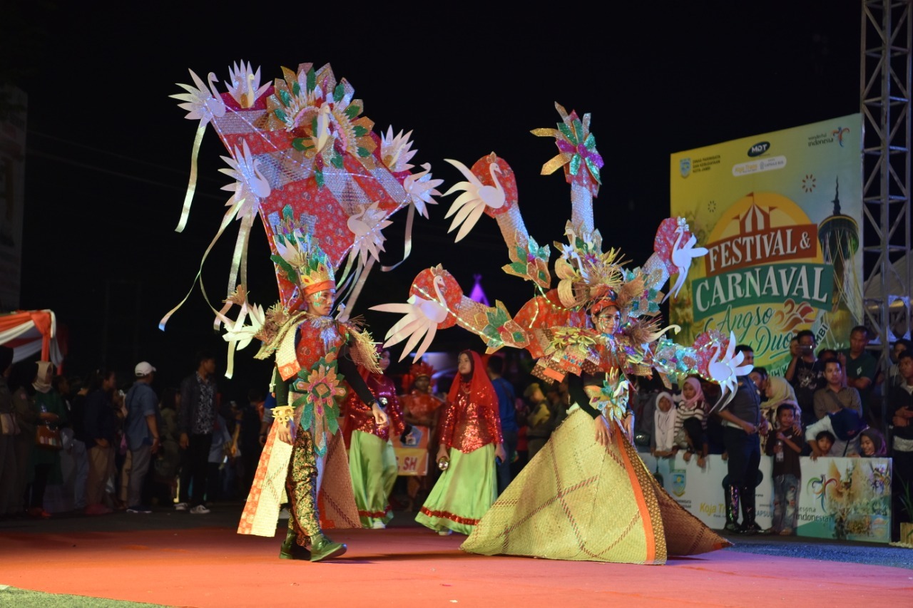 cover 2 Tahun Didera Covid-19, Festival Carnaval Angso Duo Kota Jambi Kembali Digelar Meriah